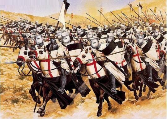 Чому тамплієрів спалювали на вогнищах?