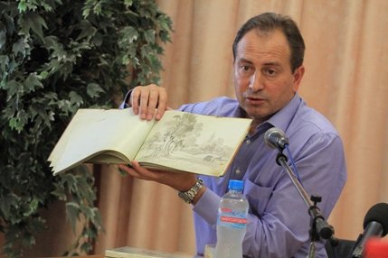 Невтомний Томенко